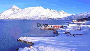 Snow Covered Shore and Mountain