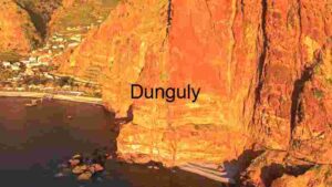 Rocky cliff near blue sea