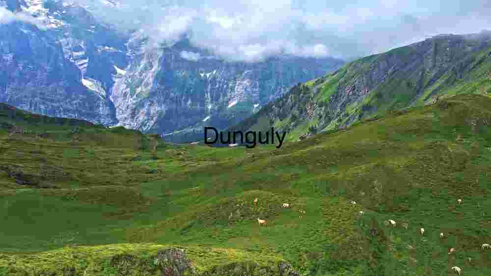 Grassy Snowy and Cloudy Mountain