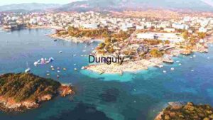 Crowded Beaches Full of People and Sails