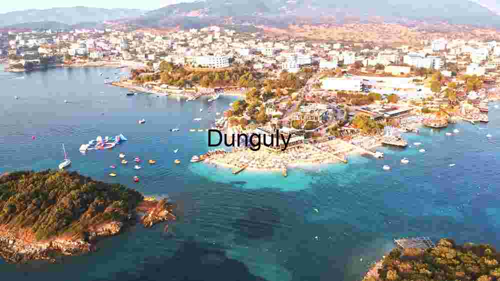 Crowded Beaches Full of People and Sails