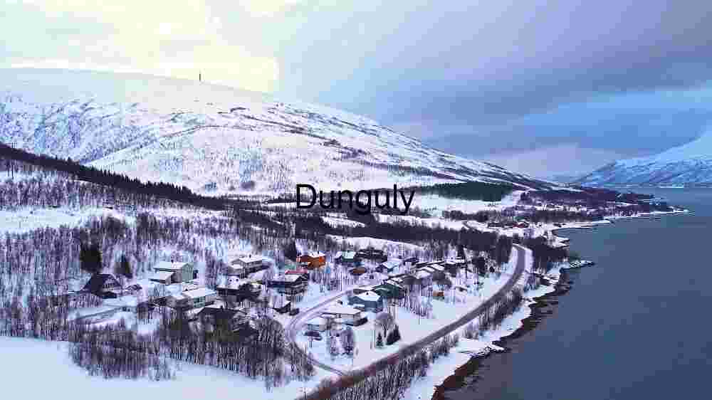 Alps and Houses Covered by Snow
