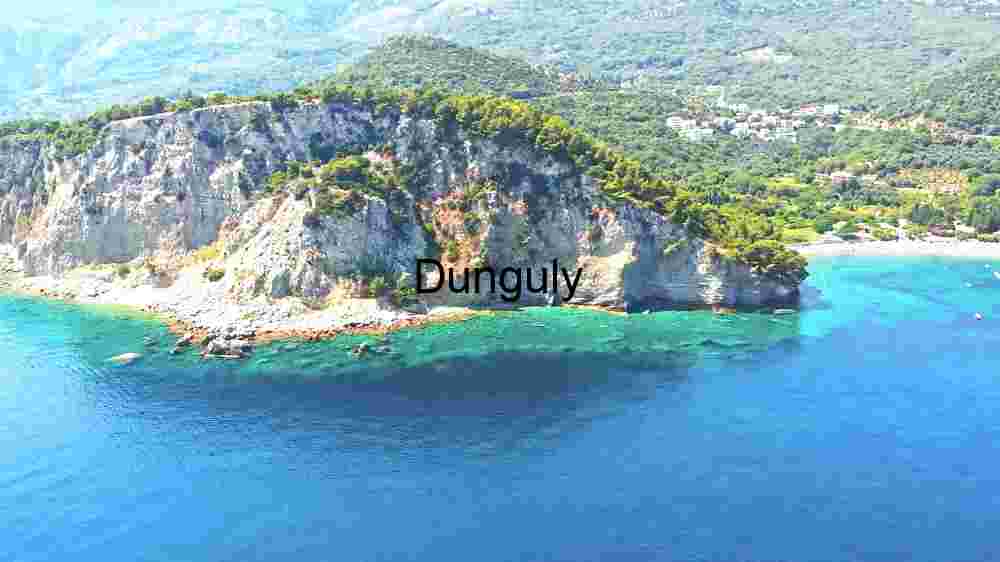 Coastal Elegance: Aerial View of a Lush Cliffside