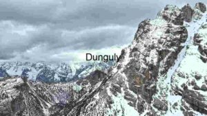 Majestic Alpine Peaks Under a Cloudy Sky