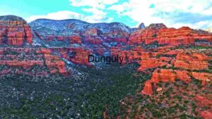 Winter's Embrace: Red Rock Canyons Under a Snowy Blanket
