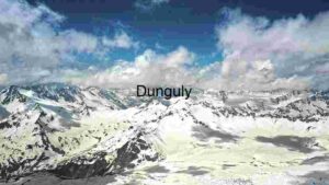 Majestic Mountain Range Under Cloud-Covered Sky