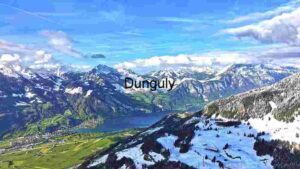 Alpine Majesty: A Panoramic View of Snow-Capped Peaks and Verdant Valleys