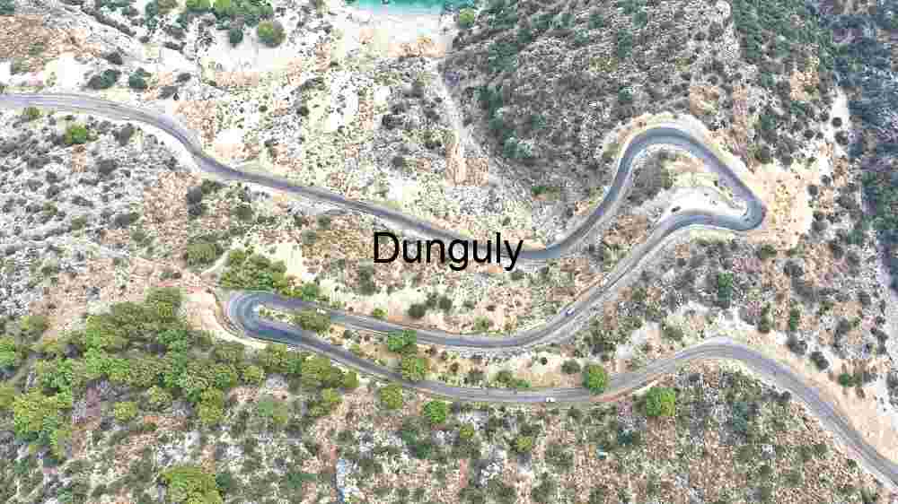 Serpentine Road Through Rugged Terrain