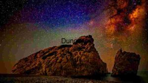 Starry Night Over Rocky Shore