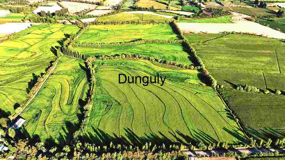 Serene Mountain Road Under Dramatic Skies