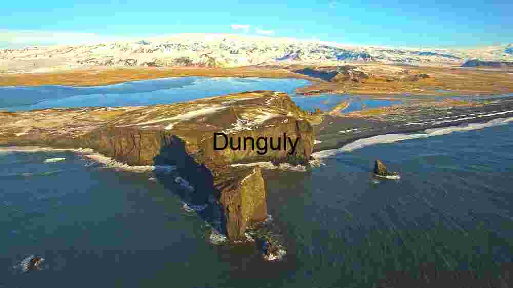 Majestic Coastal Cliffs and Snow-Capped Mountains