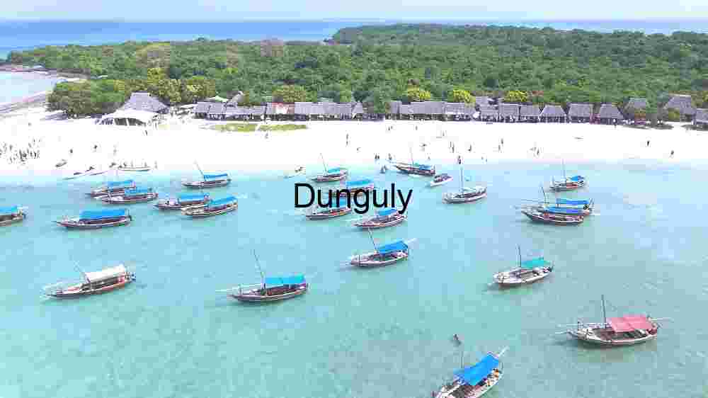 Tropical Serenity: Boats at Anchor by the Beach