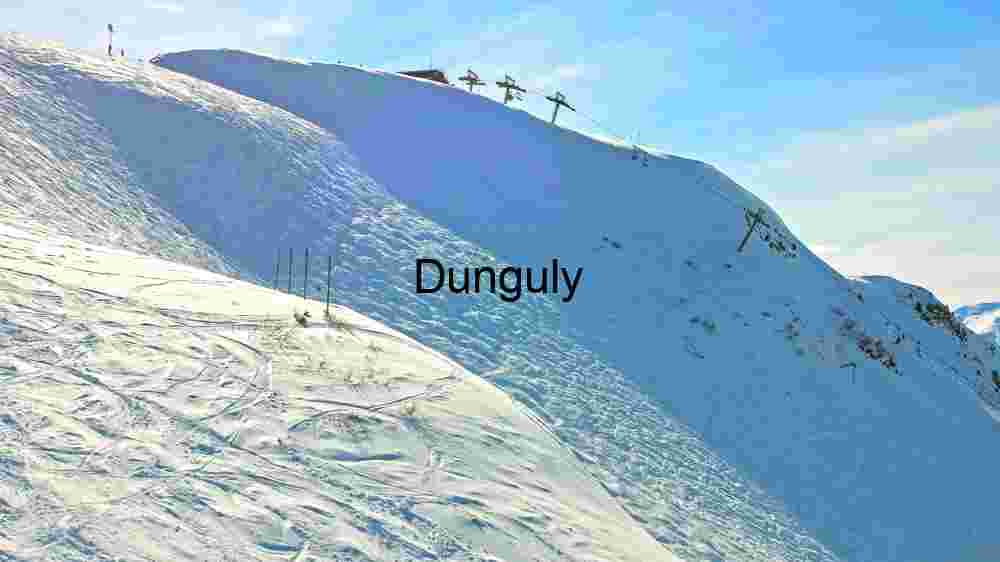 Snow-Covered Mountain Slope with Ski Lift