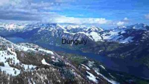 Majestic Alpine Landscape with Snow-Capped Mountains and Serene Lake