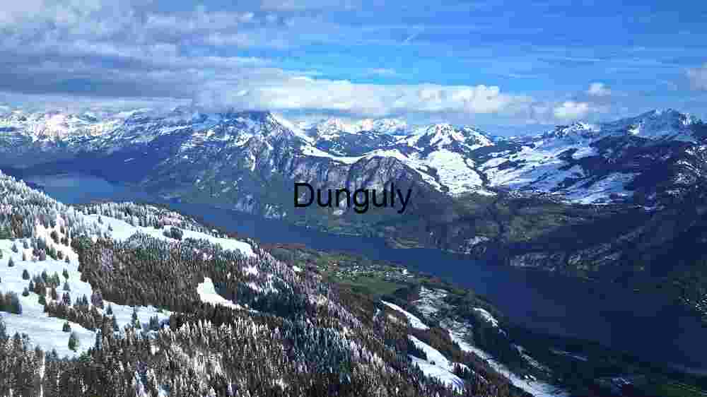 Majestic Alpine Landscape with Snow-Capped Mountains and Serene Lake