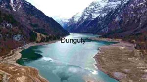 Serene Alpine Lake Nestled in Snow-Capped Mountains