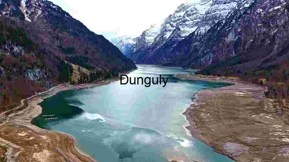 Serene Alpine Lake Nestled in Snow-Capped Mountains