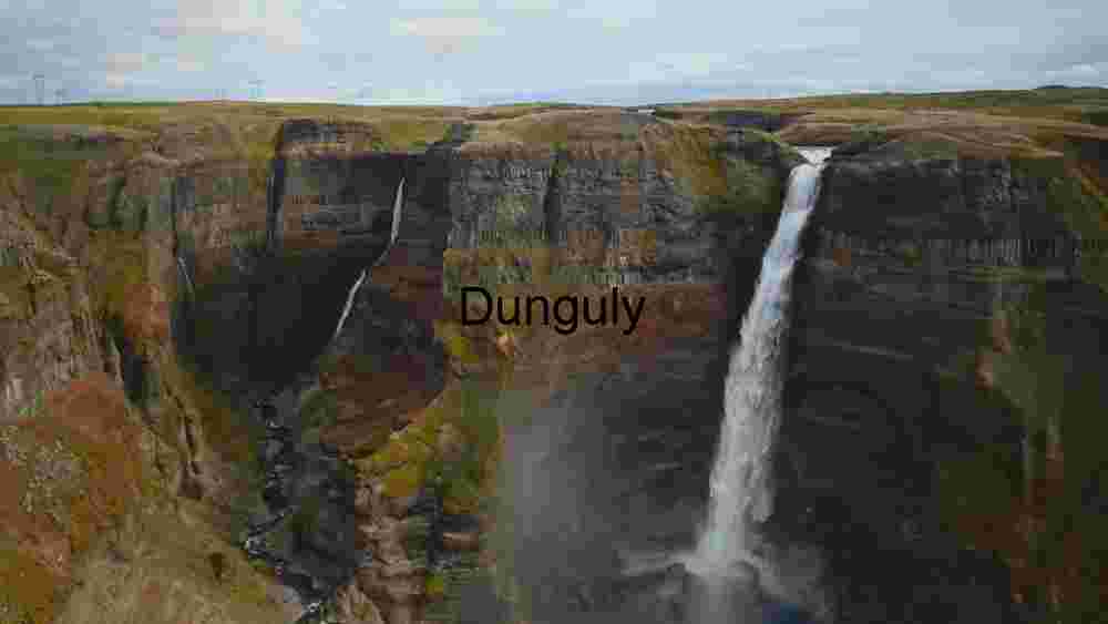 Majestic Waterfall in Rugged Terrain