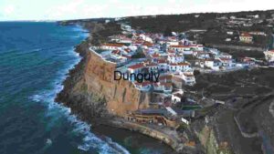 Coastal Cliffs and Whitewashed Village