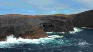 Majestic Coastal Cliffs Under Blue Skies