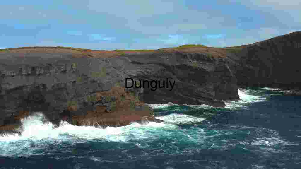 Majestic Coastal Cliffs Under Blue Skies