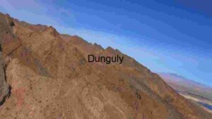 Majestic Mountain Range Under Clear Blue Sky