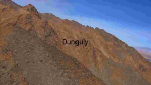 Majestic Mountain Range Under Clear Blue Sky