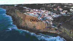Coastal Cliffs and Village Aerial View