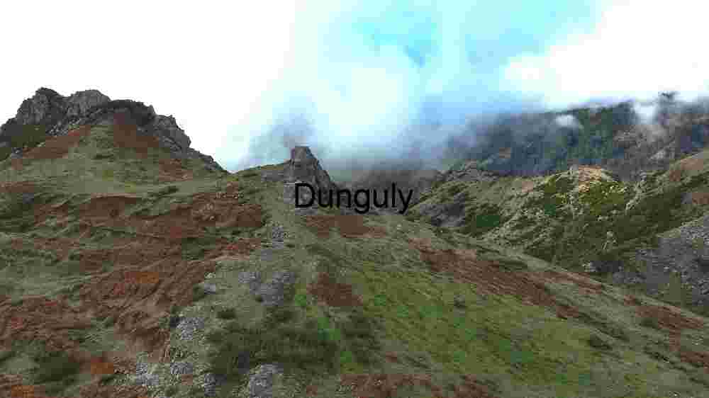 Majestic Mountain Peaks Shrouded in Mist