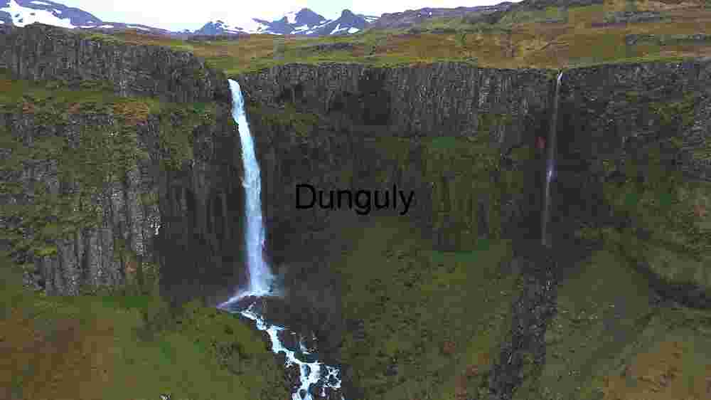 Majestic Twin Waterfalls in Lush Green Landscape