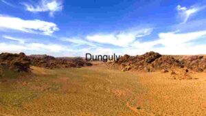 Vast Desert Landscape Under Blue Sky