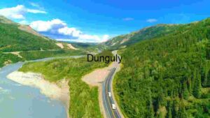 Serene Alaskan Highway Amidst Nature’s Grandeur