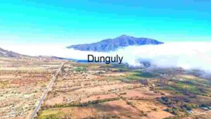Aerial View of a Mountainous Landscape with Encroaching Clouds