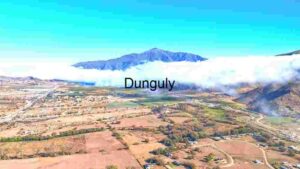Aerial View of Cloud-Covered Mountain and Countryside