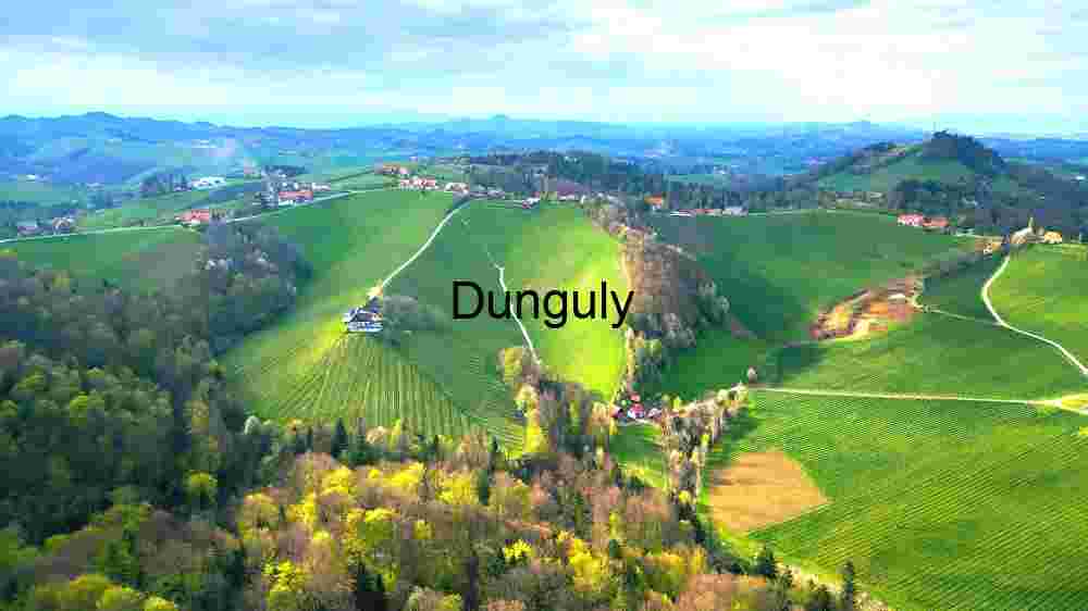 Verdant Hills and Farmhouses: Aerial View