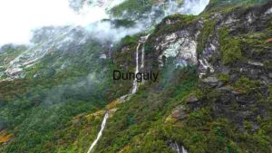 Majestic Waterfall in Lush Greenery