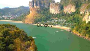 Tropical Beachside Cliffs and Resort Town