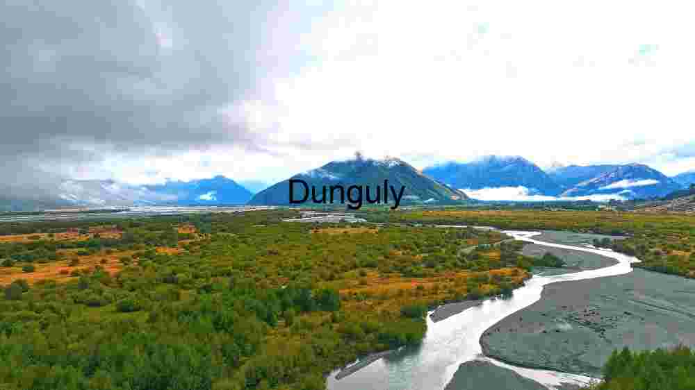 Serene River Landscape with Majestic Mountains