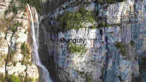 Majestic Waterfall Amidst Rugged Cliffs