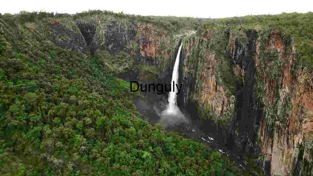 Majestic Waterfall in a Lush Canyon