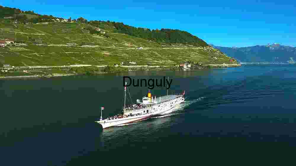 Vintage Paddle Steamer Cruising on a Serene Lake