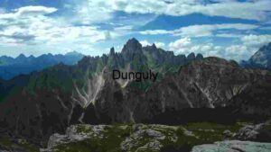 Majestic Mountain Peaks Under a Cloudy Sky