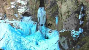 Frozen Waterfall in Rocky Terrain