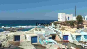 Coastal Village with Whitewashed Buildings and Blue Doors