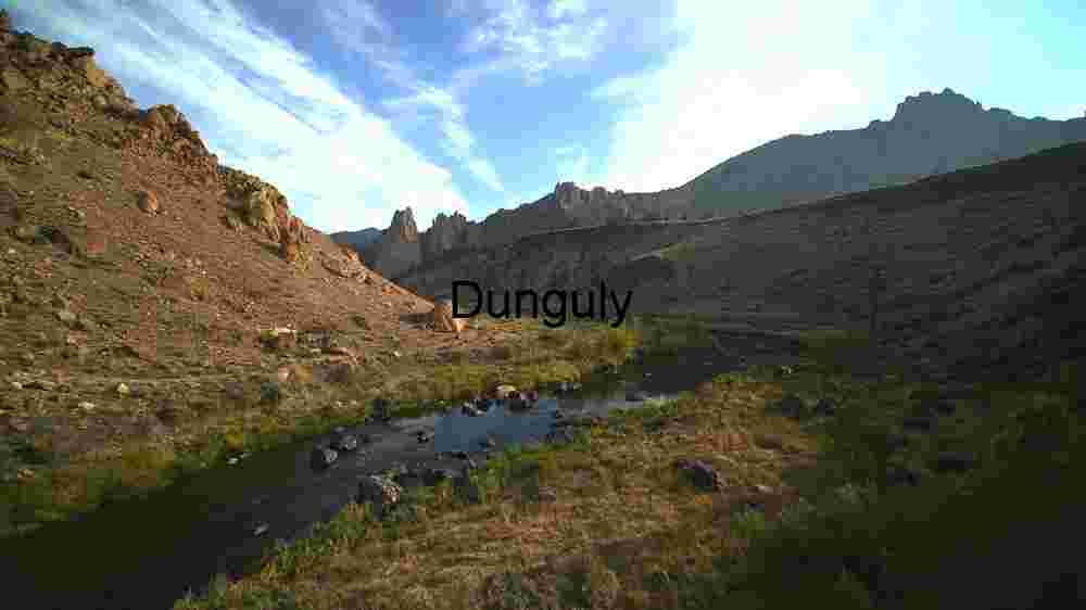 Serene River Valley in Rocky Terrain