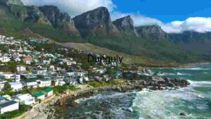 Coastal Town with Mountain Backdrop