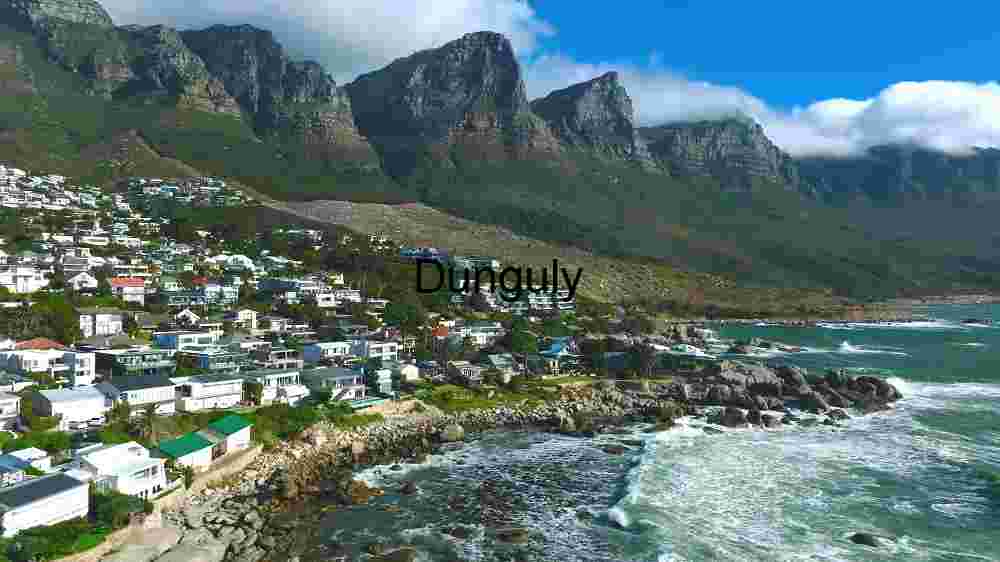 Coastal Town with Mountain Backdrop