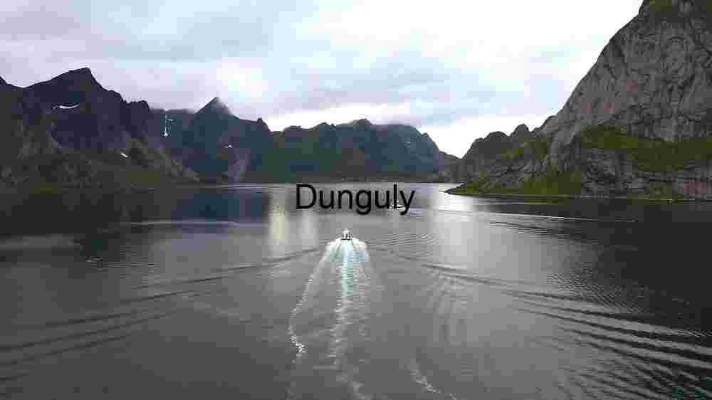 Serene Fjord with Boats and Majestic Mountains