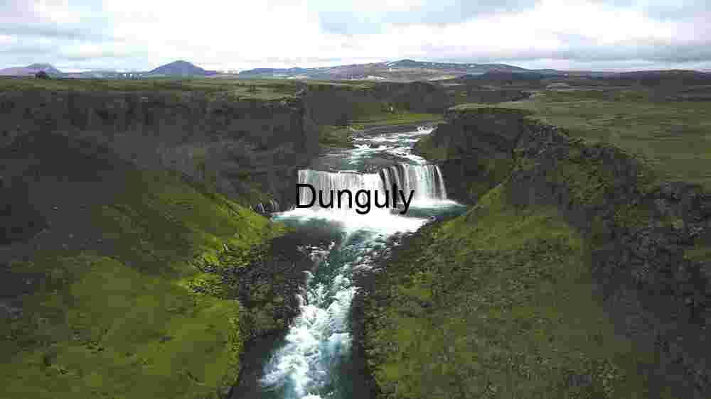 Majestic Waterfall in a Verdant Canyon
