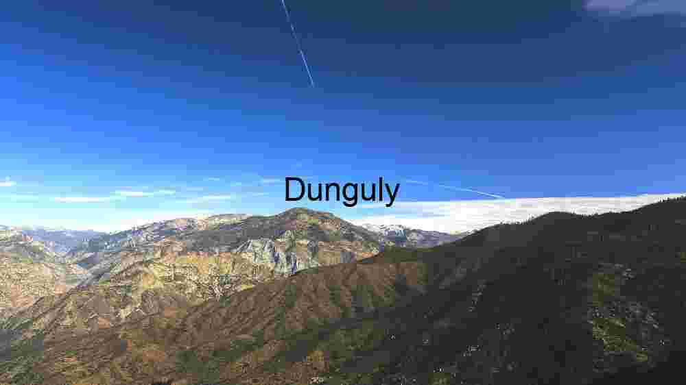 Majestic Mountain Range Under Clear Blue Sky
